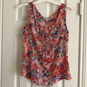 Banana Republic sheer, sleeveless blouse.